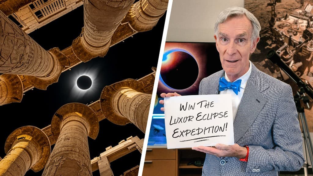 Simulated totality through Egyptian temple columns beside Bill Nye holding a sign to win the Luxor eclipse expedition